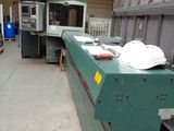an image of a machine shop with many machines in it
