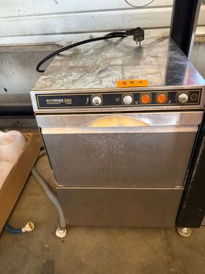 an image of a dishwasher with a box of eggs in the background