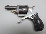 a gun that is sitting on a table