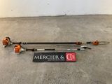 a couple of tools sitting on top of a cement floor