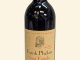 a bottle of wine that is sitting on a table