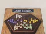 an image of a game of chinese checkers on a table