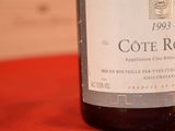 a bottle of wine that is sitting on a table