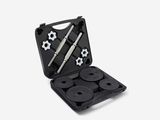 une image représentant un ensemble d'outils dans un coffret, sur fond blanc