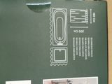 a picture of a green box with instructions on it