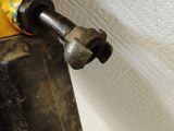 a close up of a drill on a piece of paper
