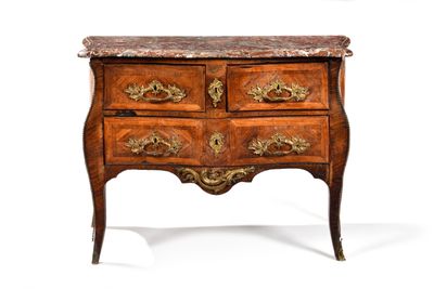 a marble top chest of drawers with a marble top