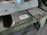 an old machine with a number on the side of it