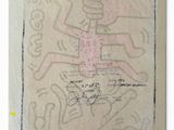 a drawing of a person on a piece of paper with writing on it
