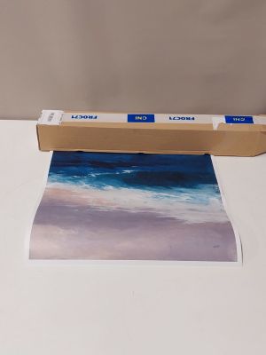une image représentant une photo d'une plage avec une boîte d'aquarelles