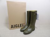 an image of a pair of green rain boots next to a box