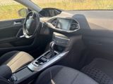 the interior of a car with a dashboard and steering controls
