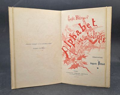 an open book with a red cover on a black background