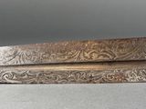 pair of antique silver plated trays with carved designs