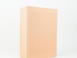 a close up of a cardboard box on a white surface