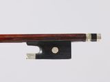 a close up of a violin bow on a white background