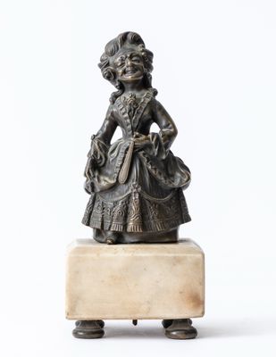 statue of a woman with a basket of flowers on a marble base