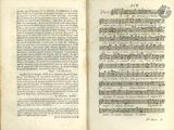 an old book with a page of music written in it
