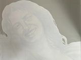 a drawing of a woman with long hair smiling