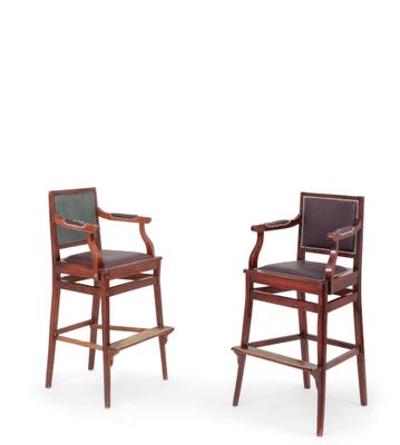 pair of mahogany and leather bar stools with arms