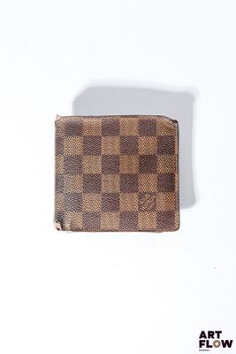 LOUIS VUITTON Portefeuille en toile enduite monogrammée