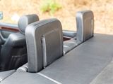 a close up of a car seat with the back of it
