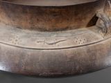 a close up of a metal bowl on a table