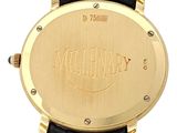 yellow gold plated watch with black leather strap and black leather band