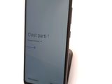 the back view of a smartphone with a display on it ' s screen
