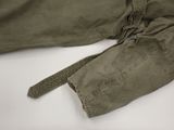 an image of a close up of a pair of pants on a white surface