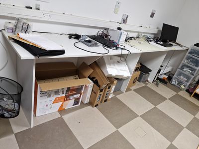 an image of a work space with a desk and a laptop