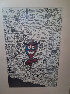 painting of a cartoon character with many doodles on a wall