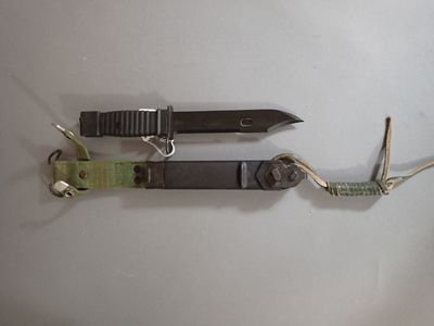 two tools that are laying on a table