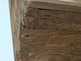 a wooden box that has a hole in it