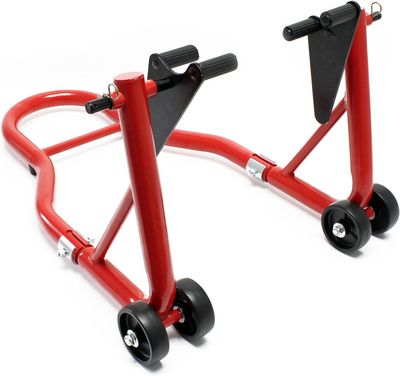 two red bicycle stands with black wheels on a white background