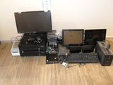 a lot of electronic equipment that is sitting on the floor