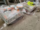 a pile of construction materials sitting on the ground
