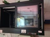 an image of a microwave oven in a kitchen