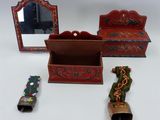 a small wooden box with a mirror and a pair of shoes next to it