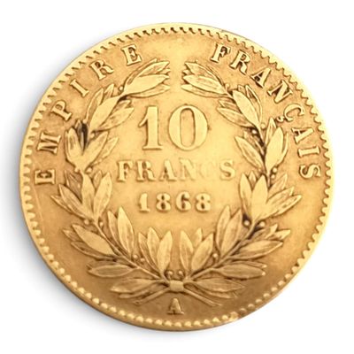 l'image d'une pièce d'or sur laquelle figure le chiffre 10