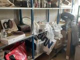 a room filled with lots of items that are on the shelves
