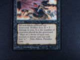 a close up of a card with a picture of a dragon on it