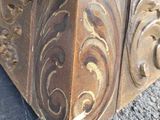 a close up of a metal box on a marble floor