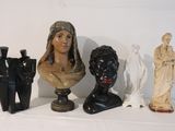 three busturines of women and a man on a shelf