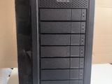 a picture of a black computer tower on a white table