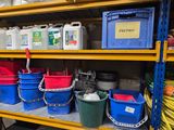 many buckets of different colors and sizes on the shelves