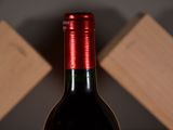 a bottle of wine that is sitting on a table