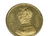 l'image d'une pièce d'or sur laquelle figure le visage d'une femme