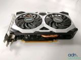 a close up of a video card with two fans on it