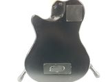 an image of a black electric guitar on a stand